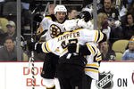 PITTSBURGH, PA - JANUARY 10:  Marc Savard #91 of the Boston Bruins celebrates a power play goal by Mark Recchi #28 against the Pittsburgh Penguins on January 10, 2011 at Consol Energy Center in Pittsburgh, Pennsylvania.  The Bruins defeated the Penguins 4-2.  (Photo by Justin K. Aller/Getty Images)