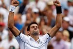 NEW YORK, NY - SEPTEMBER 10:  Novak Djokovic of Serbia reacts after he won his match against Roger Federer of Switzerland during Day Thirteen of the 2011 U.S. Open at the USTA Billie Jean King National Tennis Center on September 10, 2011 in the Flushing neighborhood of the Queens borough of New York City.  (Photo by Mike Stobe/Getty Images for USTA)
