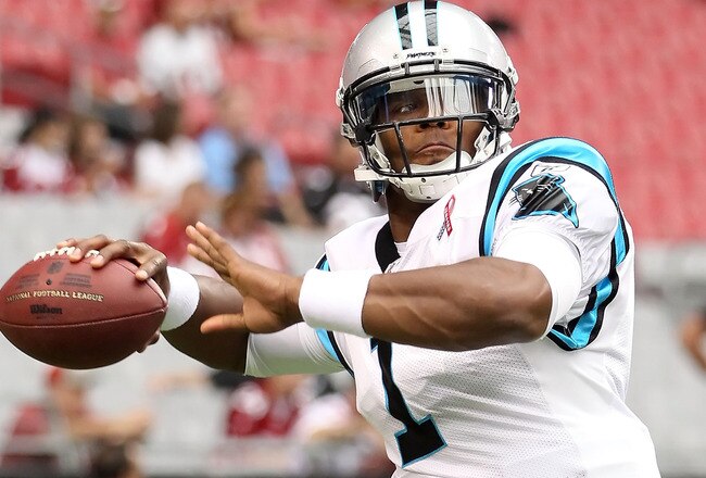 GLENDALE, AZ - SEPTEMBER 11:  Quarterback Cam Newton #1 of the Carolina Panthers warms up before the NFL season opening game against the Arizona Cardinals at the University of Phoenix Stadium on September 11, 2011 in Glendale, Arizona. The Carindals defeated the Panthers 28-21.  (Photo by Christian Petersen/Getty Images)