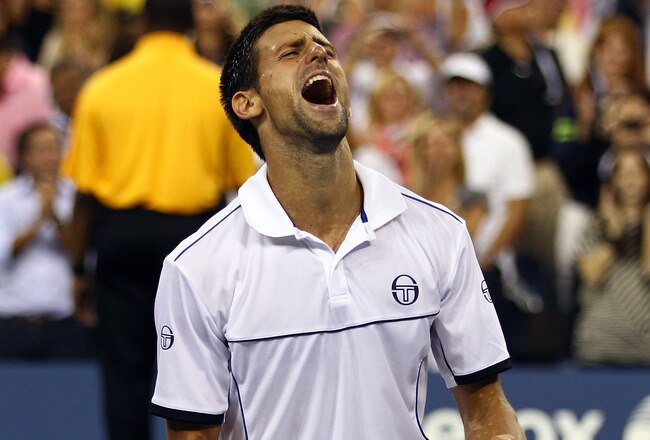 NEW YORK, NY - SEPTEMBER 12:  Novak Djokovic of Serbia reacts after he won match point against Rafael Nadal of Spain during the Men's Final on Day Fifteen of the 2011 US Open at the USTA Billie Jean King National Tennis Center on September 12, 2011 in the Flushing neighborhood of the Queens borough of New York City.  (Photo by Clive Brunskill/Getty Images)