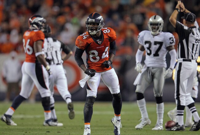 DENVER, CO - SEPTEMBER 12:  Wide receiver Brandon Lloyd #84 of the Denver Broncos celebrates his first down reception against the Oakland Raiders at Sports Authority Field at Mile High on September 12, 2011 in Denver, Colorado.  (Photo by Doug Pensinger/Getty Images)