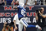 HOUSTON - SEPTEMBER 11:  Wide receiver Reggie Wayne #87 of the Indianapolis Colts gets both feet down in the back of end-zone for a touchdown in the fourth quarter against the Houston Texans at Reliant Stadium during a season opener on September 11, 2011 in Houston, Texas.  (Photo by Bob Levey/Getty Images)