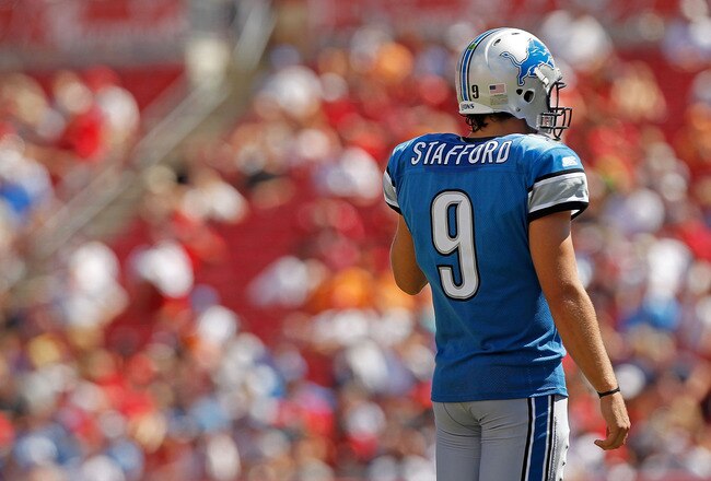 TAMPA, FL - SEPTEMBER 11:  Matthew Stafford #9 of the Detroit Lions waits for a play during the season opener against the Tampa Bay Buccaneers at Raymond James Stadium on September 11, 2011 in Tampa, Florida.  (Photo by Mike Ehrmann/Getty Images)