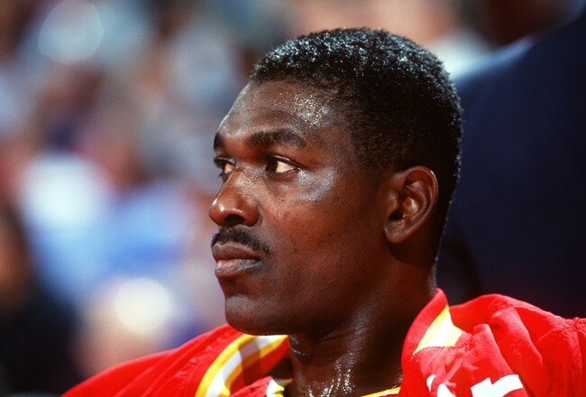 1993:  A CANDID PORTRAIT OF HOUSTON ROCKETS CENTER HAKEEM OLAJUWON ON THE BENCH BEFORE A GAME AGAINST THE NUGGETS. Mandatory Credit: Tim Defrisco/ALLSPORT