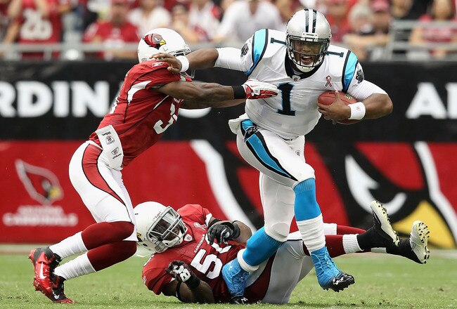 GLENDALE, AZ - SEPTEMBER 11:  Quarterback Cam Newton #1 of the Carolina Panthers is sacked by cornerback Richard Marshall #31 of the Arizona Cardinals during the first quarter of the NFL season opening game at the University of Phoenix Stadium on September 11, 2011 in Glendale, Arizona.  (Photo by Christian Petersen/Getty Images)