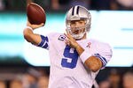 EAST RUTHERFORD, NJ - SEPTEMBER 11:  Tony Romo #9 of the Dallas Cowboys throws a pass against the New York Jets during their NFL Season Opening Game at MetLife Stadium on September 11, 2011 in East Rutherford, New Jersey.  (Photo by Elsa/Getty Images)
