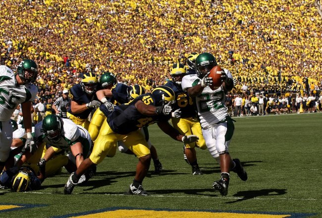 ANN ARBOR, MI - SEPTEMBER 19:  Running back Dwayne Priest #22 of the Eastern Michigan Eagles celebrates as he scores on a  five yard touchdown run in the second quarter against the Michigan Wolverines  at Michigan Stadium on September 19, 2009 in Ann Arbor, Michigan.  Michigan won 45-17.  (Photo by Stephen Dunn/Getty Images)