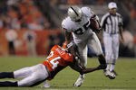 DENVER, CO - SEPTEMBER 12:  Wide reciever  Darrius Heyward-Bey #85 of the Oakland Raiders makes and  Champ Bailey #24 of the Denver Broncos makes the tackle at Sports Authority Field at Mile High on September 12, 2011 in Denver, Colorado.  (Photo by Doug Pensinger/Getty Images)