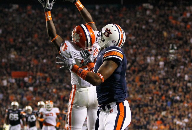 AUBURN, AL - SEPTEMBER 18:  Xavier Brewer #29 of the Clemson Tigers intercepts a pass intended for Shaun Kitchens #4 of the Auburn Tigers at Jordan-Hare Stadium on September 18, 2010 in Auburn, Alabama.  (Photo by Kevin C. Cox/Getty Images)