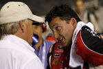 RICHMOND, VA - SEPTEMBER 10:  Tony Stewart (R), driver of the #14 Office Depot/Mobil 1 Chevrolet, speaks with team owner Rick Hendrick after clinching a spot in the 'Chase for the Sprint Cup' following the NASCAR Sprint Cup Series Wonderful Pistachios 400 at Richmond International Raceway on September 10, 2011 in Richmond, Virginia.  (Photo by Jeff Zelevansky/Getty Images)
