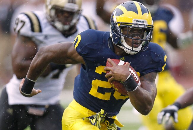 ANN ARBOR, MI - SEPTEMBER 03:  Michael Shaw #20 of the Michigan Wolverines runs for a third quarter touchdown while playing the Western Michigan Broncos at Michigan Stadium on September 3, 2010 in Ann Arbor, Michigan. (Photo by Gregory Shamus/Getty Images)