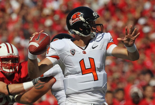 MADISON, WI - SEPTEMBER 10:  Sean Mannion #4 of the Oregon State Beavers throws a pass against the Wisconsin Badgers at Camp Randall Stadium on September 10, 2011 in Madison Wisconsin. Wisconsin defeated Oregon State 35-0. (Photo by Jonathan Daniel/Getty Images)