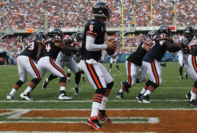 CHICAGO, IL - SEPTEMBER 11: Jay Cutler #6 of the Chicago Bears looks for a receiver as teammates (L-R) J'Marcus Webb #73, Chris Williams #74, Roberto Garza #63 and Chris Spencer #67 block against the Atlanta Falcons at Soldier Field on September 11, 2011 in Chicago, Illinois. The Bears defeated the Falcons 30-12. (Photo by Jonathan Daniel/Getty Images)