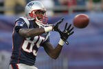 FOXBORO, MA - SEPTEMBER 1:   Chad Ochocinco #85 of the New England Patriots completes a drill before a game with the New York Giants at Gillette Stadium on September 1, 2011 in Foxboro, Massachusetts. (Photo by Jim Rogash/Getty Images)