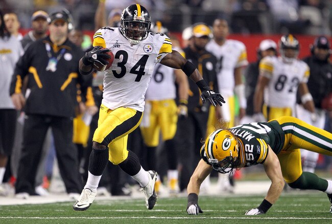 ARLINGTON, TX - FEBRUARY 06:  Rashard Mendenhall #34 of the Pittsburgh Steelers runs the ball against Clay Matthews #52 of the Green Bay Packers during Super Bowl XLV at Cowboys Stadium on February 6, 2011 in Arlington, Texas. The Packers won 31-25.  (Photo by Jamie Squire/Getty Images)
