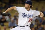 LOS ANGELES, CA - SEPTEMBER 14:  Clayton Kershaw #22 of the Los Angeles Dodgers pitches against the Arizona Diamondbacks during the first inning at Dodger Stadium on September 14, 2011 in Los Angeles, California.  (Photo by Harry How/Getty Images)