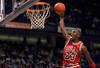 1990 -1991:  Michael Jordan #23 of the Chicago Bulls goes up for a dunk during an NBA game against the Dallas Mavericks at Reunion Arena in Dallas, Texas.  (Photo by Joe Patronite/Getty Images)