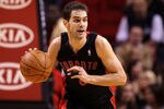 MIAMI, FL - JANUARY 22:  Jose Calderon #8 of the Toronto Raptors dribbles the ball during a game against the Miami Heat at American Airlines Arena on January 22, 2011 in Miami, Florida. NOTE TO USER: User expressly acknowledges and agrees that, by downloading and/or using this Photograph, User is consenting to the terms and conditions of the Getty Images License Agreement.  (Photo by Mike Ehrmann/Getty Images)