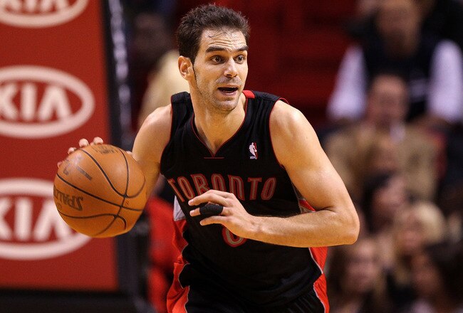 MIAMI, FL - JANUARY 22:  Jose Calderon #8 of the Toronto Raptors dribbles the ball during a game against the Miami Heat at American Airlines Arena on January 22, 2011 in Miami, Florida. NOTE TO USER: User expressly acknowledges and agrees that, by downloading and/or using this Photograph, User is consenting to the terms and conditions of the Getty Images License Agreement.  (Photo by Mike Ehrmann/Getty Images)