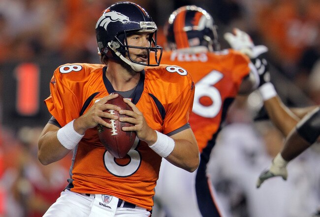 DENVER, CO - SEPTEMBER 12:  Quarterback Kyle Orton #8 of the Denver Broncos drops back to pass against the Oakland Raiders in the first half at Sports Authority Field at Mile High on September 12, 2011 in Denver, Colorado.  (Photo by Doug Pensinger/Getty Images)