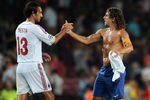 BARCELONA, SPAIN - SEPTEMBER 13:  Carles Puyol (C) of FC Barcelona greets Alessandro Nesta of AC Milan at the end of the UEFA Champions League group H match between FC Barcelona and AC Milan at the Camp Nou stadium on September 13, 2011 in Barcelona, Spain.  (Photo by Jasper Juinen/Getty Images)