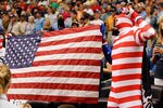 ST. PETERSBURG, FL - SEPTEMBER 11:  Fans of the Tampa Bay Rays celebrate during the singing of God Bless America during the game against the Boston Red Sox at Tropicana Field on September 11, 2011 in St. Petersburg, Florida.  (Photo by J. Meric/Getty Images)