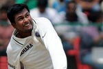 BANGALORE, INDIA - OCTOBER 10:  Pragyan Ojha of India bowls during day two of the Second Test match between India and Australia at M.Chinnaswamy Stadium on October 10, 2010 in Bangalore, India.  (Photo by Pal Pillai/Getty Images)
