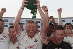 TAUNTON, ENGLAND - SEPTEMBER 15:  Lancashire captain Glenn Chapple lifts the Championship trophy and leads his sides celebrations during the LV County Championship match between Somerset and Lancashire at the County Ground on September 15, 2011 in Taunton, England.  (Photo by Michael Steele/Getty Images)