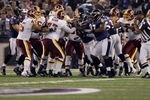 BALTIMORE, MD - AUGUST 25:  Members of the Baltimore Ravens and Washington Redskins are seperated after a field goal by the Redskins during the first half of a preseason game at M&T Bank Stadium on August 25, 2011 in Baltimore, Maryland.  (Photo by Rob Carr/Getty Images)