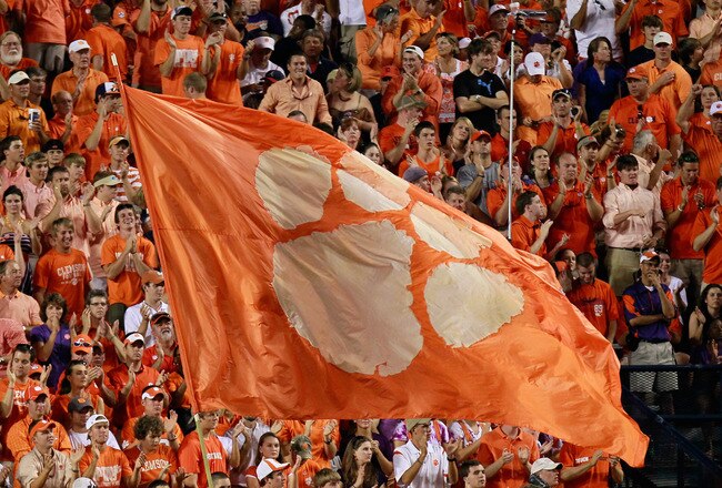 AUBURN, AL - SEPTEMBER 18:  Cheerleaders of the Clemson Tigers wave their flag during the game against the Auburn Tigers at Jordan-Hare Stadium on September 18, 2010 in Auburn, Alabama.  (Photo by Kevin C. Cox/Getty Images)