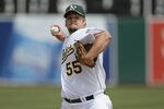 OAKLAND, CA - MAY 25:  Pitcher Joe Blanton #55 of the Oakland Athletics delivers a pitch against the Boston Red Sox on May 25, 2008 at McAfee Coliseum in Oakland, California. Oakland won 6 to 3.  (Photo by Greg Trott/Getty Images)