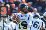 AUBURN, AL - NOVEMBER 6: Quarterback B. J. Coleman #19 of the Chattanooga Mocs sets to pass against the Auburn Tigers November 6, 2010 at Jordan-Hare Stadium in Auburn, Alabama.  Auburn won 62 - 24. (Photo by Al Messerschmidt/Getty Images)