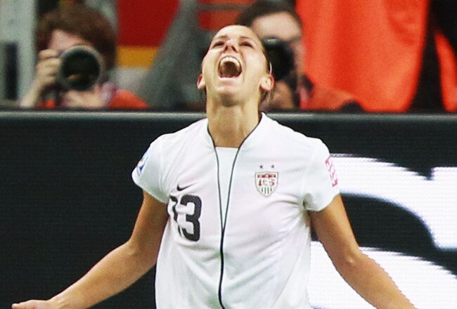 FRANKFURT AM MAIN, GERMANY - JULY 17: Alex Morgan of USA celebrates after scoring her team's first goal during the FIFA Women's World Cup Final match between Japan and USA at the FIFA World Cup stadium Frankfurt on July 17, 2011 in Frankfurt am Main, Germany.  (Photo by Joern Pollex/Getty Images)