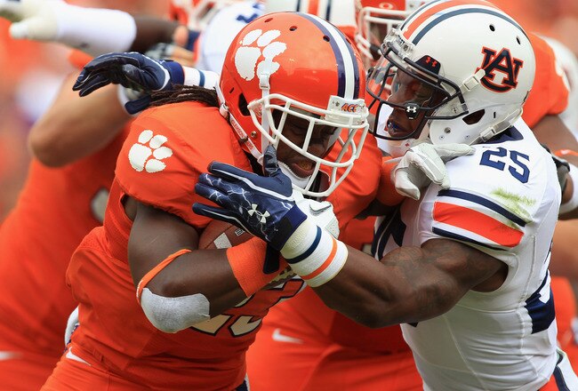 CLEMSON, SC - SEPTEMBER 17:  Andre Ellington #23 of the Clemson Tigers runs with the ball against Daren Bates #25 of the Auburn Tigers during their game at Memorial Stadium on September 17, 2011 in Clemson, South Carolina.  (Photo by Streeter Lecka/Getty Images)