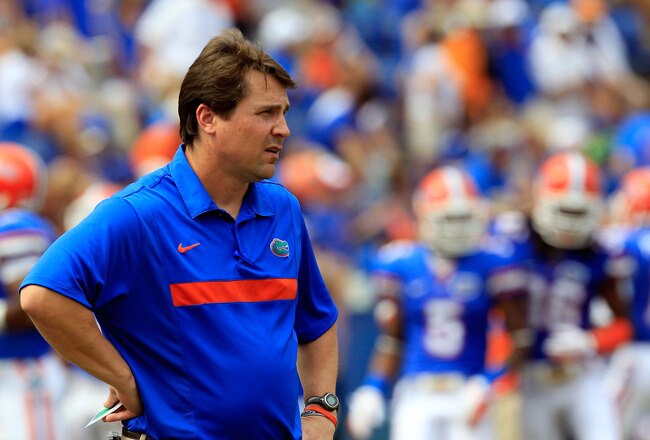 GAINESVILLE, FL - SEPTEMBER 17:  Florida Gators head coach Will Muschamp watches the action before the game against the Tennessee Volunteers at Ben Hill Griffin Stadium on September 17, 2011 in Gainesville, Florida.  (Photo by Sam Greenwood/Getty Images)