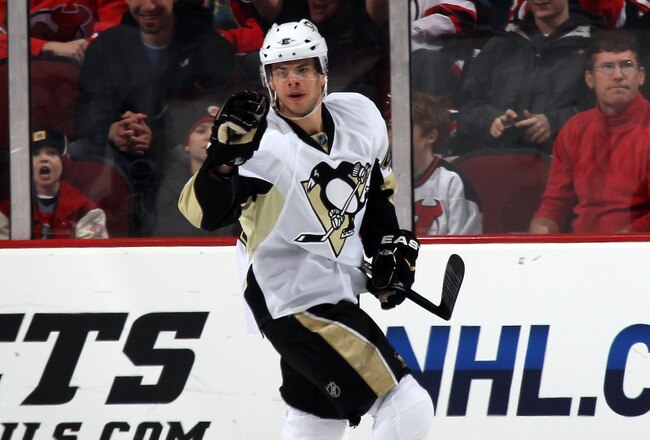 NEWARK, NJ - MARCH 04:  Tyler Kennedy #48 of the Pittsburgh Penguins scores at 5:58 of the second period against the New Jersey Devils at the Prudential Center on March 4, 2011 in Newark, New Jersey.  (Photo by Bruce Bennett/Getty Images)