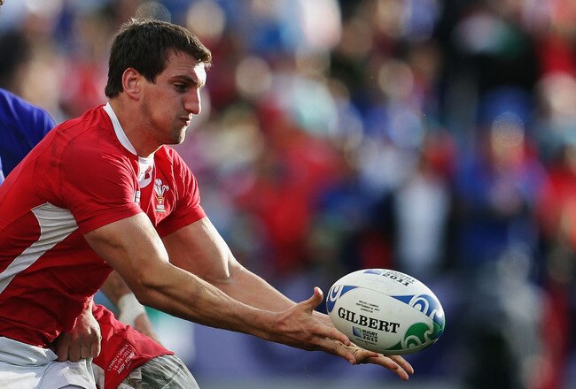 HAMILTON, NEW ZEALAND - SEPTEMBER 18: Sam Warburton of Wales disptaches the ball during the IRB 2011 Rugby World Cup Pool D match between Wales and Samoa at Waikato Stadium on September 18, 2011 in Hamilton, New Zealand.  (Photo by Hannah Johnston/Getty Images)