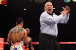 LAS VEGAS, NV - SEPTEMBER 17:  Referee Joe Cortez calls Victor Ortiz for a head-butt in the fourth round against Floyd Mayweather Jr. during their WBC welterweight title fight at the MGM Grand Garden Arena on September 17, 2011 in Las Vegas, Nevada. Mayweather Jr. knocked Ortiz out with one-second remaining in the fourth round.  (Photo by Al Bello/Getty Images)
