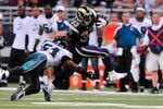 ST. LOUIS, MO - SEPTEMBER 11: Cadillac Williams #33 of the St. Louis Rams runs as Jamar Chaney #51 of the Philadelphia Eagles dives for a tackle at the Edward Jones Dome on September 11, 2011 in St. Louis, Missouri. The Eagles defeated the Rams 31-15. (Photo by Jeff Curry/Getty Images)