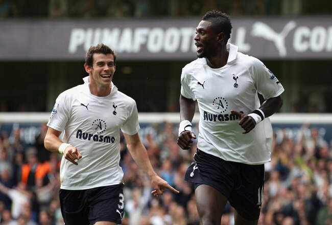 LONDON, ENGLAND - SEPTEMBER 18:  Emmanuel Adebayor of Tottenham Hotspur celebrates scoring his side's second goal with team mate Gareth Bale (L) during the Barclays Premier League match between Tottenham Hotspur and Liverpool at White Hart Lane on September 18, 2011 in London, England.  (Photo by Clive Rose/Getty Images)