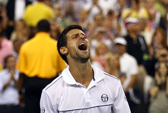 NEW YORK, NY - SEPTEMBER 12:  Novak Djokovic of Serbia reacts after he won match point against Rafael Nadal of Spain during the Men's Final on Day Fifteen of the 2011 US Open at the USTA Billie Jean King National Tennis Center on September 12, 2011 in the Flushing neighborhood of the Queens borough of New York City.  (Photo by Clive Brunskill/Getty Images)