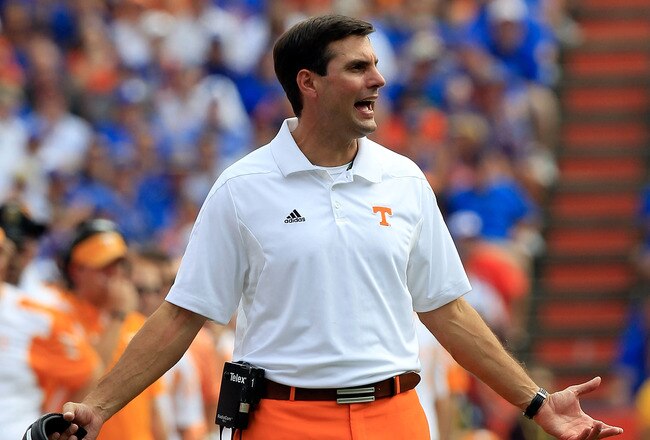 GAINESVILLE, FL - SEPTEMBER 17:  Head coach of the Tennessee Volunteers Derek Dooley speaks turnover his players during a game against the Florida Gators at Ben Hill Griffin Stadium on September 17, 2011 in Gainesville, Florida.  (Photo by Sam Greenwood/Getty Images)