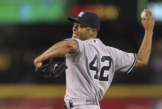 SEATTLE - SEPTEMBER 13:  Closing pitcher Mariano Rivera #42 of the New York Yankees pitches against the Seattle Mariners at Safeco Field on September 13, 2011 in Seattle, Washington. Rivera was credited with the save, the 41st of the season and 600th of his career. (Photo by Otto Greule Jr/Getty Images)