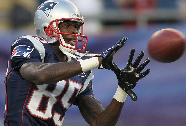 FOXBORO, MA - SEPTEMBER 1:   Chad Ochocinco #85 of the New England Patriots completes a drill before a game with the New York Giants at Gillette Stadium on September 1, 2011 in Foxboro, Massachusetts. (Photo by Jim Rogash/Getty Images)