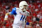 ATLANTA, GA - SEPTEMBER 03:  Kellen Moore #11 of the Boise State Broncos reacts after a touchdown against the Georgia Bulldogs at Georgia Dome on September 3, 2011 in Atlanta, Georgia.  (Photo by Kevin C. Cox/Getty Images)