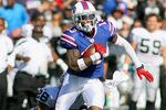 ORCHARD PARK, NY - SEPTEMBER 18: Steve Johnson #13 of the Buffalo Bills runs after a catch against Stanford Routt #26 of the Oakland Raiders at Ralph Wilson Stadium on September 18, 2011 in Orchard Park, New York.  (Photo by Rick Stewart/Getty Images)