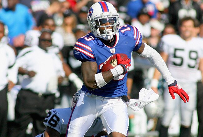 ORCHARD PARK, NY - SEPTEMBER 18: Steve Johnson #13 of the Buffalo Bills runs after a catch against Stanford Routt #26 of the Oakland Raiders at Ralph Wilson Stadium on September 18, 2011 in Orchard Park, New York.  (Photo by Rick Stewart/Getty Images)