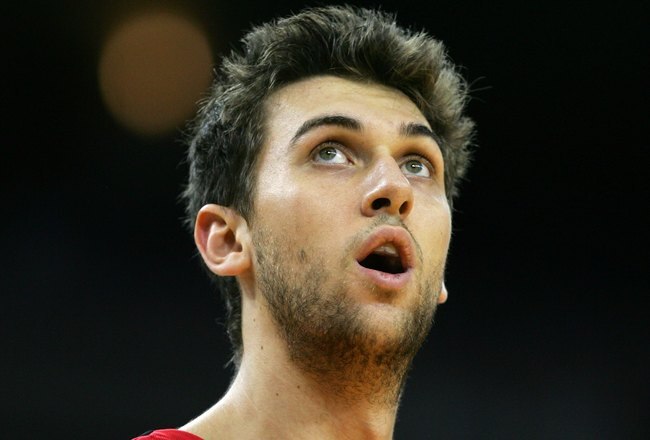 OAKLAND, CA - NOVEMBER 14:  Andrea Bargnani #7 of the Toronto Raptors looks on during action against the Golden State Warriors November 14, 2006 at Oracle Arena in Oakland, California. NOTE TO USER: User expressly acknowledges and agrees that, by downloading and/or using this Photograph, user is consenting to the terms and conditions of the Getty Images License Agreement.  (Photo by Jed Jacobsohn/Getty Images)