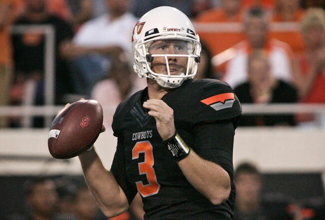 STILLWATER, OK - SEPTEMBER 8:  Quarterback Brandon Weeden #3 of the Oklahoma State Cowboys looks to throw during the second half against the Arizona Wildcats on September 8, 2011 at Boone Pickens Stadium in Stillwater, Oklahoma.  Oklahoma State defeated Arizona 37-14.  (Photo by Brett Deering/Getty Images)