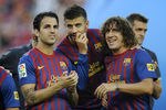 BARCELONA, SPAIN - AUGUST 22:  Cesc Fabregas (L) and Gerard Pique (C) and Carles Puyol of FC Barcelona joke prior the Joan Gamper Trophy match between FC Barcelona and SSC Napoli at the Camp Nou Stadium on August 22, 2011 in Barcelona, Spain.  (Photo by David Ramos/Getty Images)